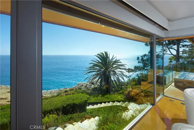 a outdoor dining space with furniture and outdoor view