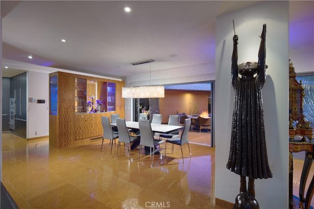 a bathroom with a granite countertop sink a mirror and shower