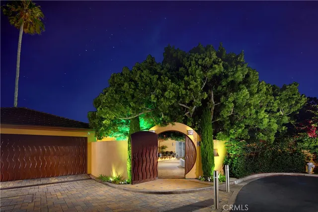 a view of balcony with two potted plants