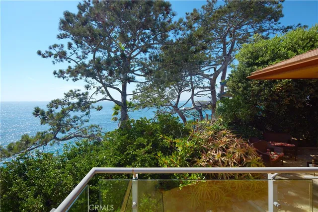 a view of a city with an ocean view