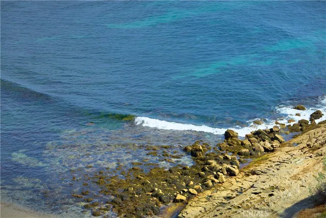a view of ocean with beach