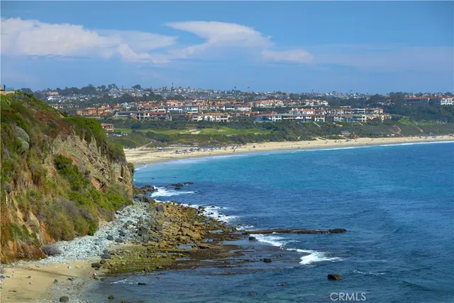 a view of a yard with snow on the road