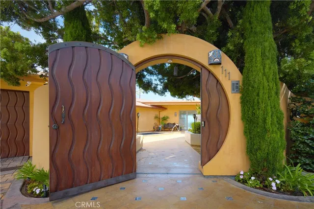a living room with fireplace furniture and a flat screen tv