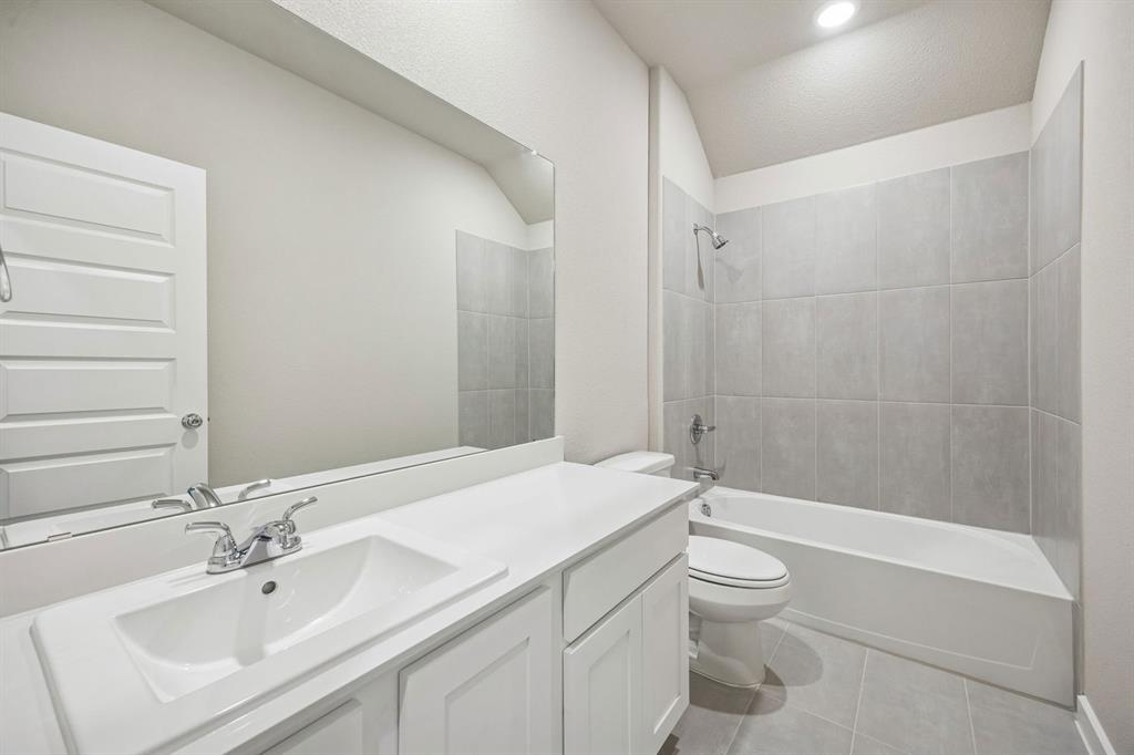 1113 Del Rio Drive Lavon, TX 75166 - Photo 32 of 40 Bathroom in the Wimbledon home plan by Trophy Signature Homes – REPRESENTATIVE PHOTO