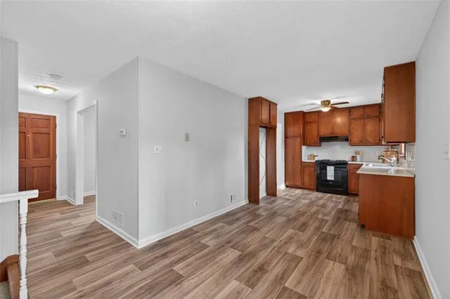 a view of kitchen with wooden floor