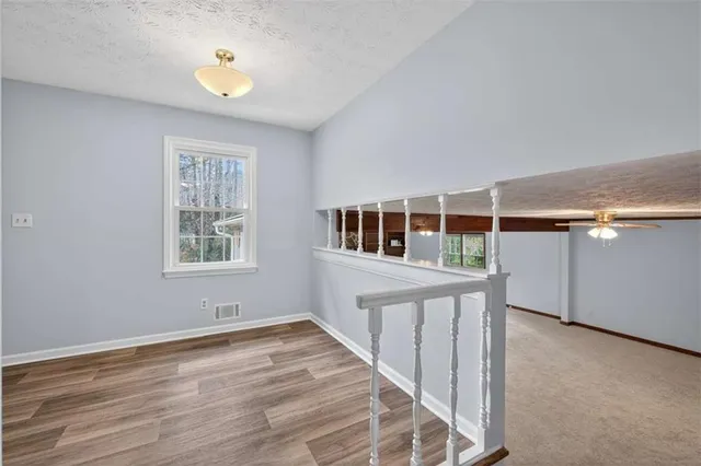 a view of kitchen with furniture and window
