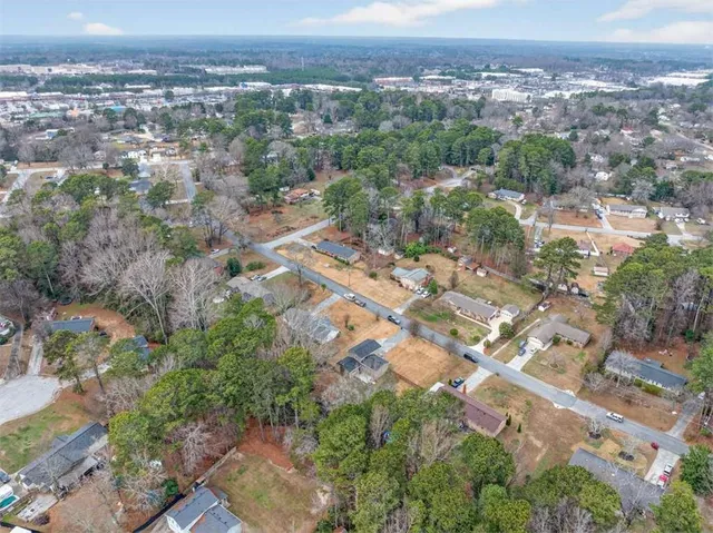 a view of yard along with trees