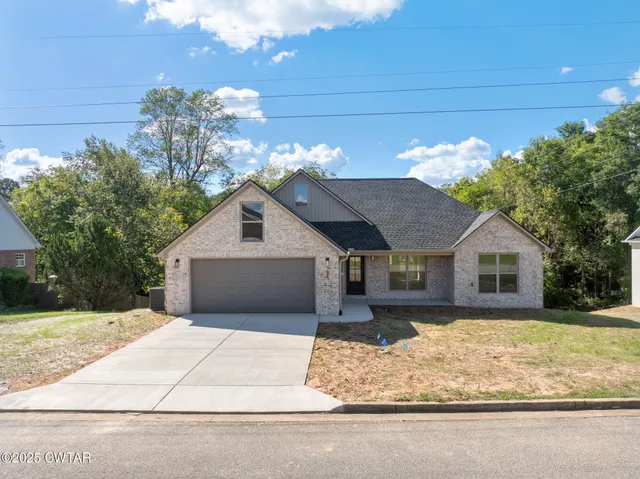 a house view with a outdoor space