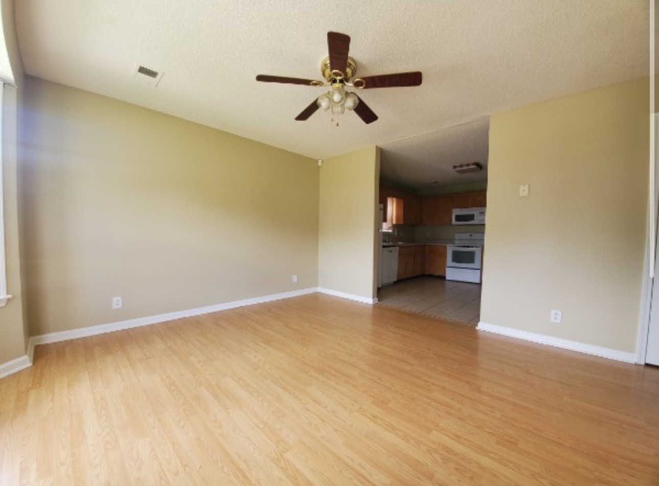 1058 Shadow Ridge Avenue Oak Grove, KY 42262 - Photo 2 of 7 a view of an empty room and a window
