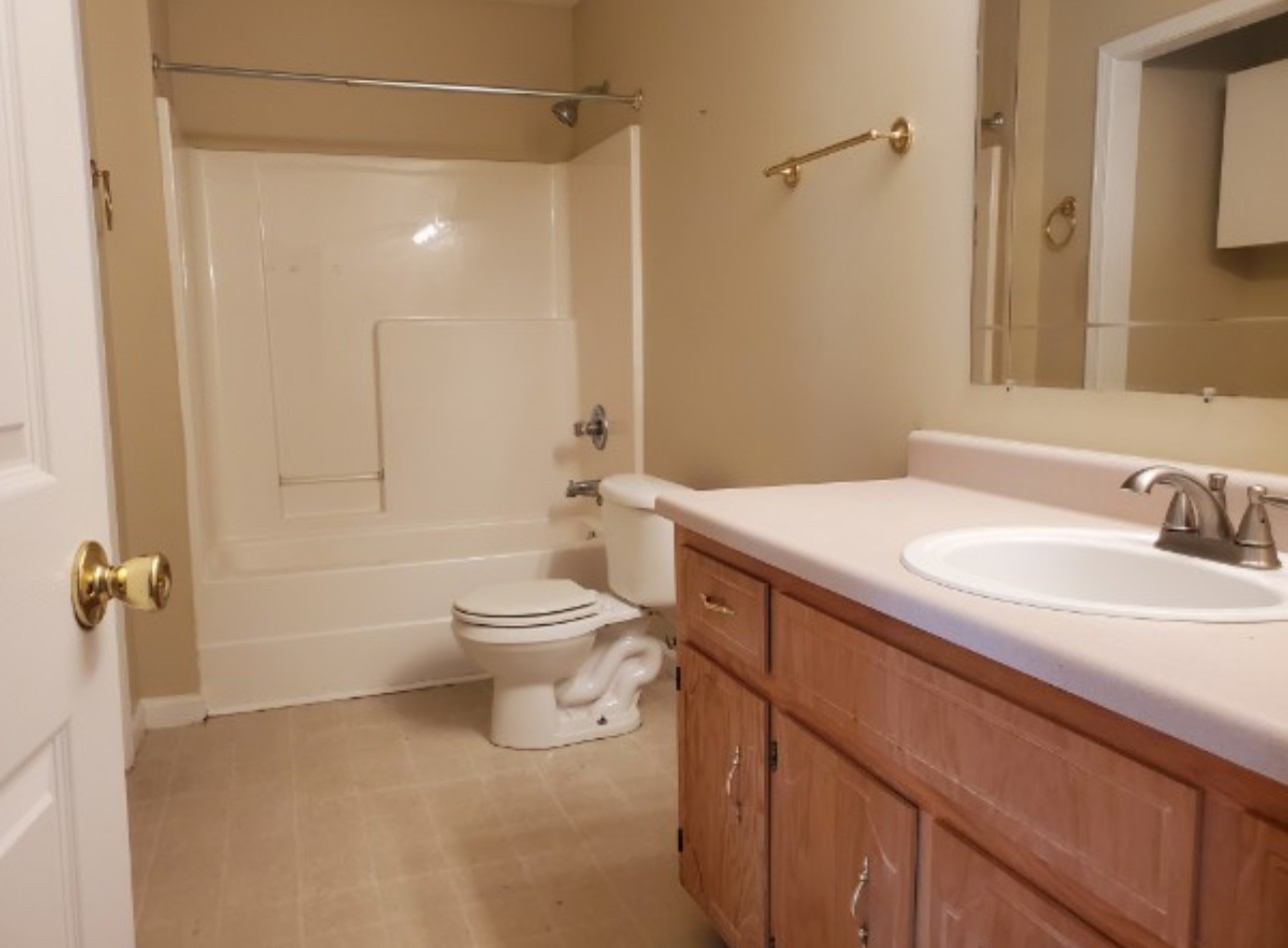 1058 Shadow Ridge Avenue Oak Grove, KY 42262 - Photo 5 of 7 a bathroom with a sink a toilet and shower