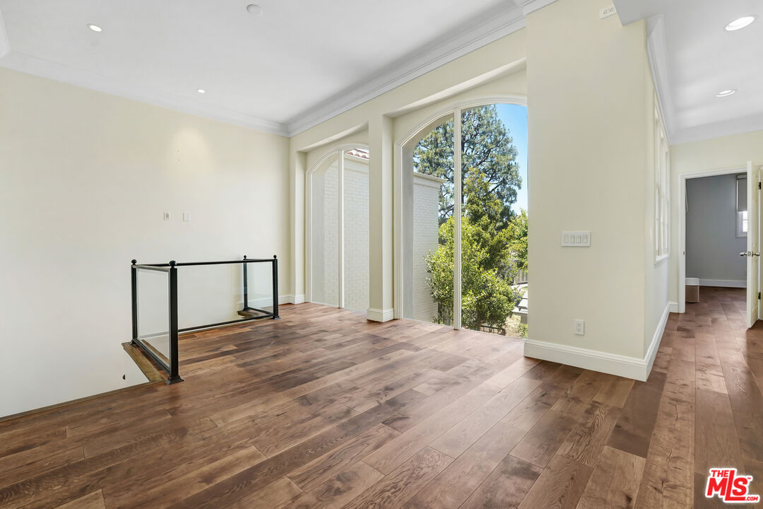 12320 Ridge Circle Los Angeles, CA 90049 - Photo 15 of 38 a view of entryway with wooden floor