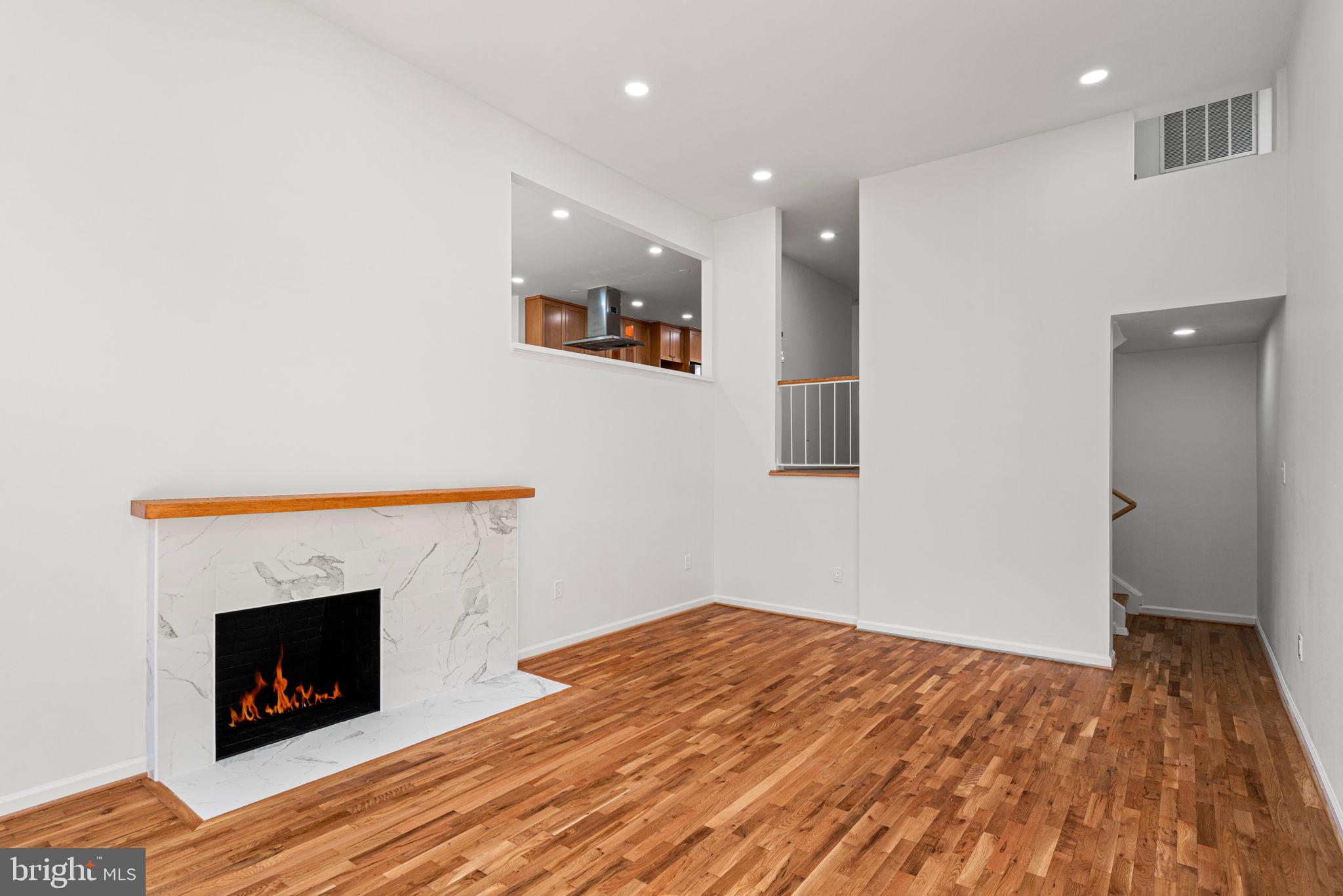 11446 Links Drive Reston, VA 20190 - Photo 26 of 87 Soaring Tall Ceilings w/ Wood Burning Fireplace