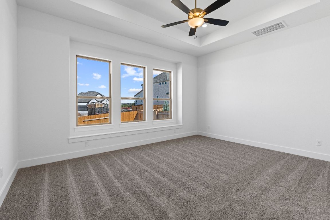 1620 Lilly Grace Bend Leander, TX 78641 - Photo 15 of 40 a view of an empty room with a window