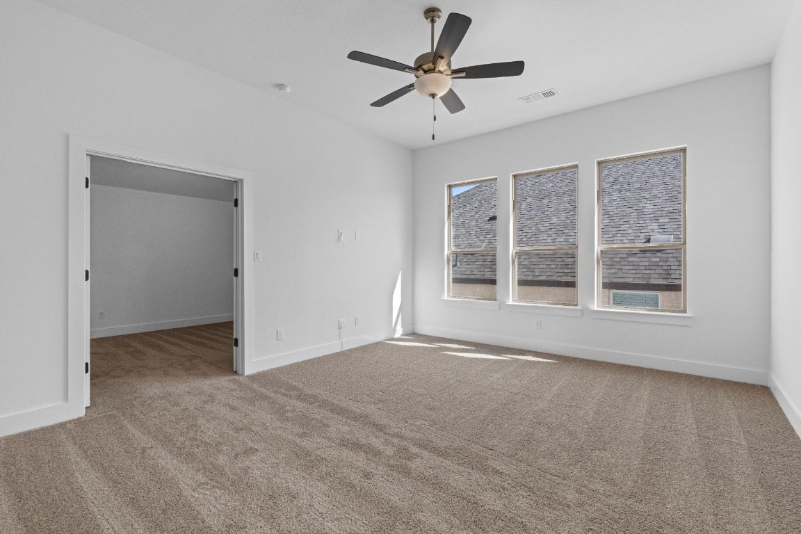 1620 Lilly Grace Bend Leander, TX 78641 - Photo 22 of 40 a view of an empty room with a window