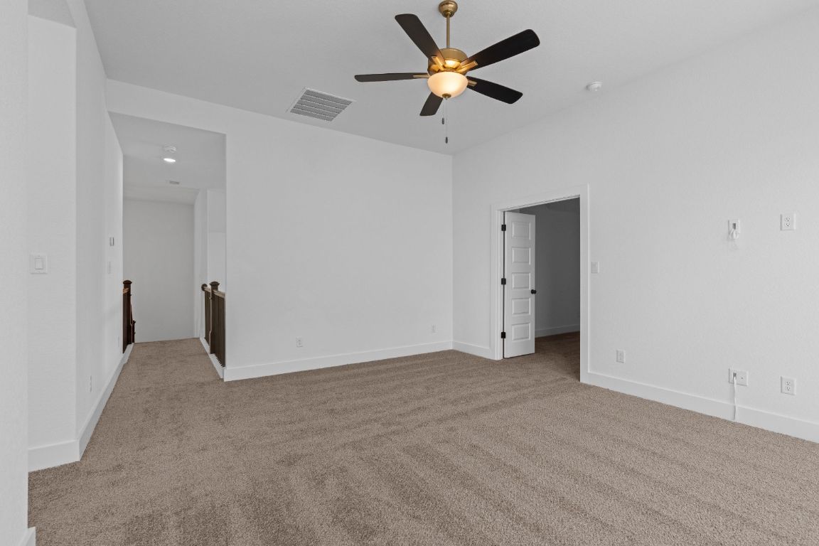 1620 Lilly Grace Bend Leander, TX 78641 - Photo 23 of 40 a view of an empty room