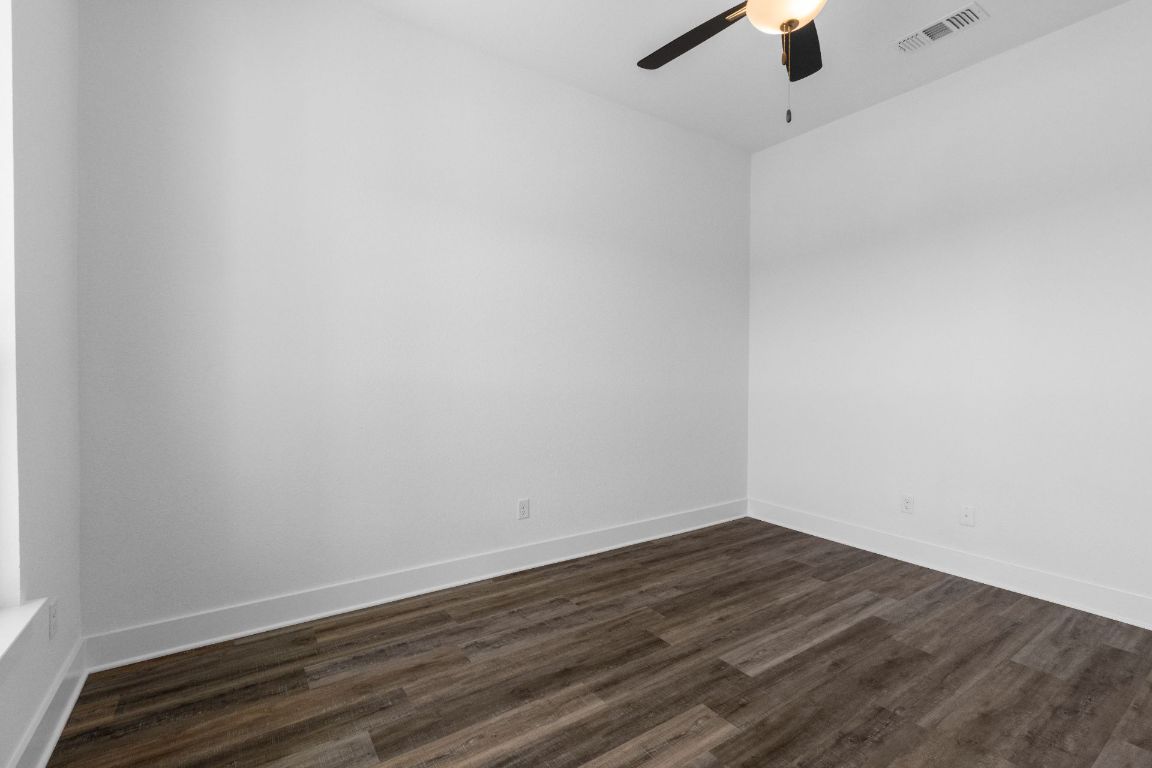1620 Lilly Grace Bend Leander, TX 78641 - Photo 26 of 40 a view of a room with wooden floor
