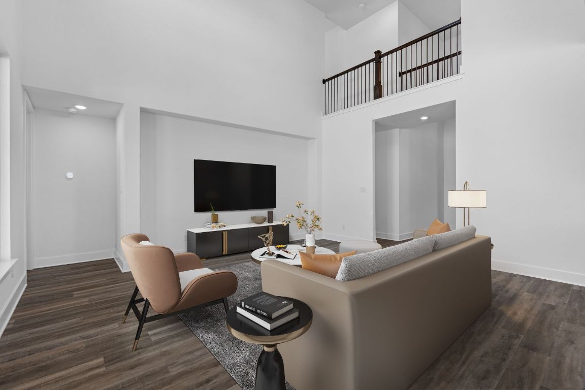 1620 Lilly Grace Bend Leander, TX 78641 - Photo 5 of 40 a living room with furniture and a flat screen tv