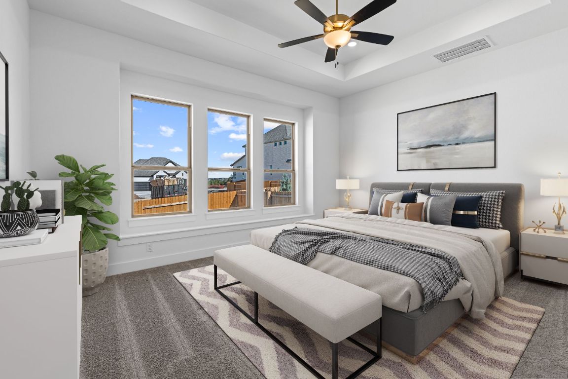 1620 Lilly Grace Bend Leander, TX 78641 - Photo 6 of 40 a bedroom with a large bed and a window