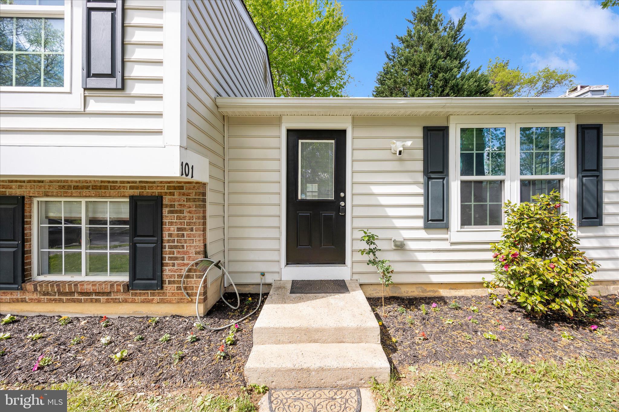101 Andover Court Frederick, MD 21702 - Photo 2 of 29 a front view of a house with garden
