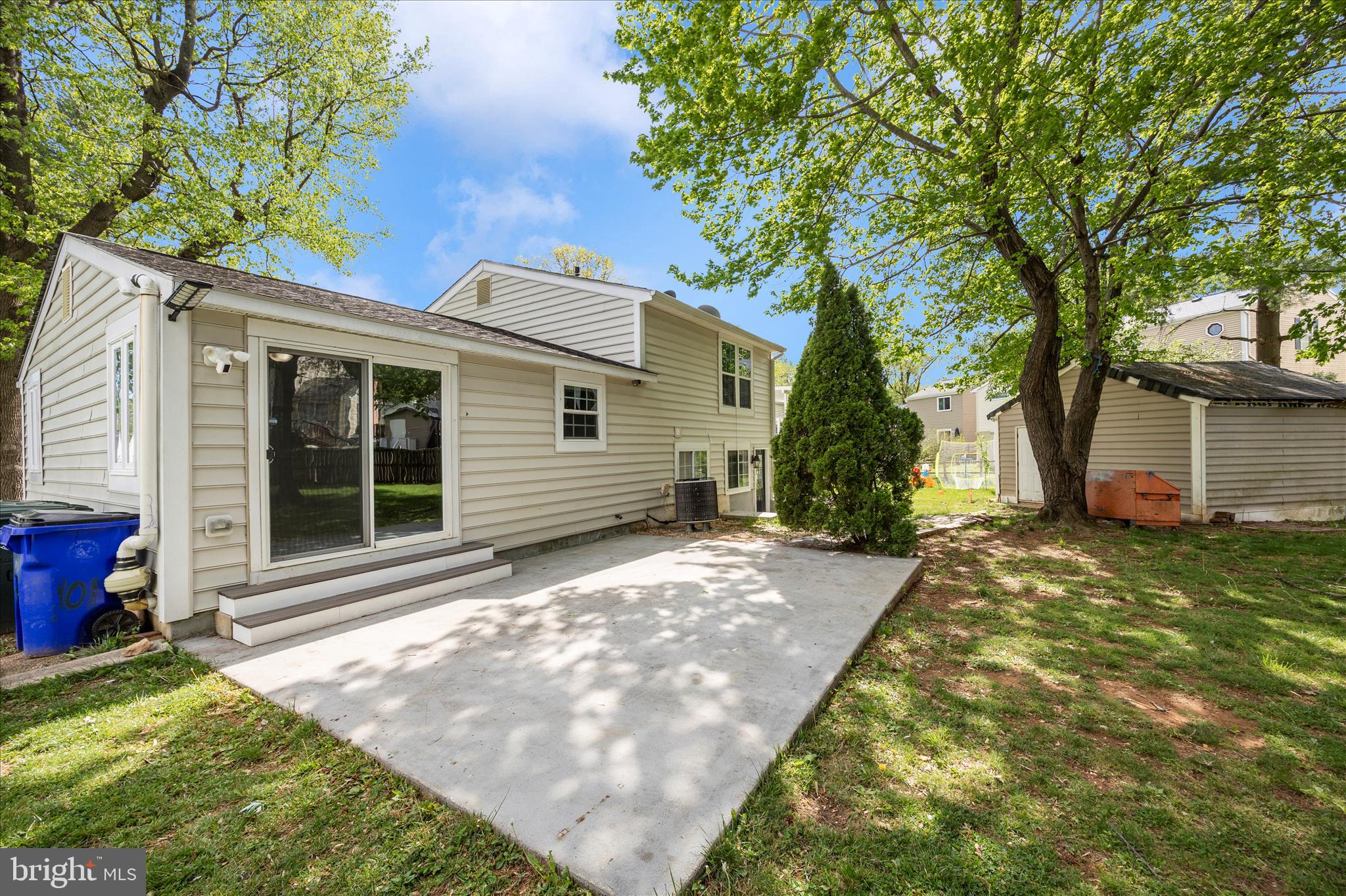 101 Andover Court Frederick, MD 21702 - Photo 22 of 29 a view of a backyard with a large tree