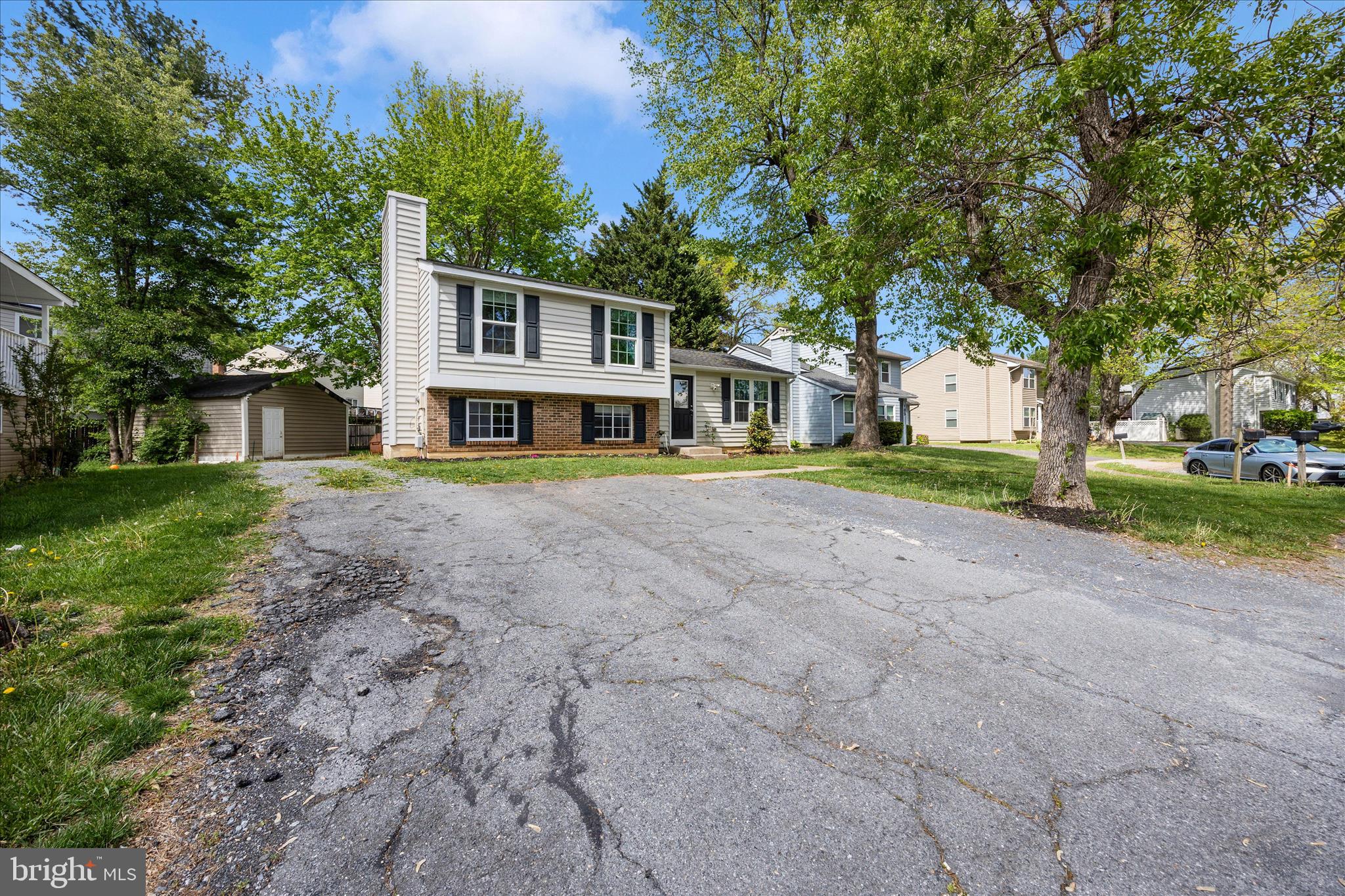 101 Andover Court Frederick, MD 21702 - Photo 29 of 29 a front view of a house with a yard and trees