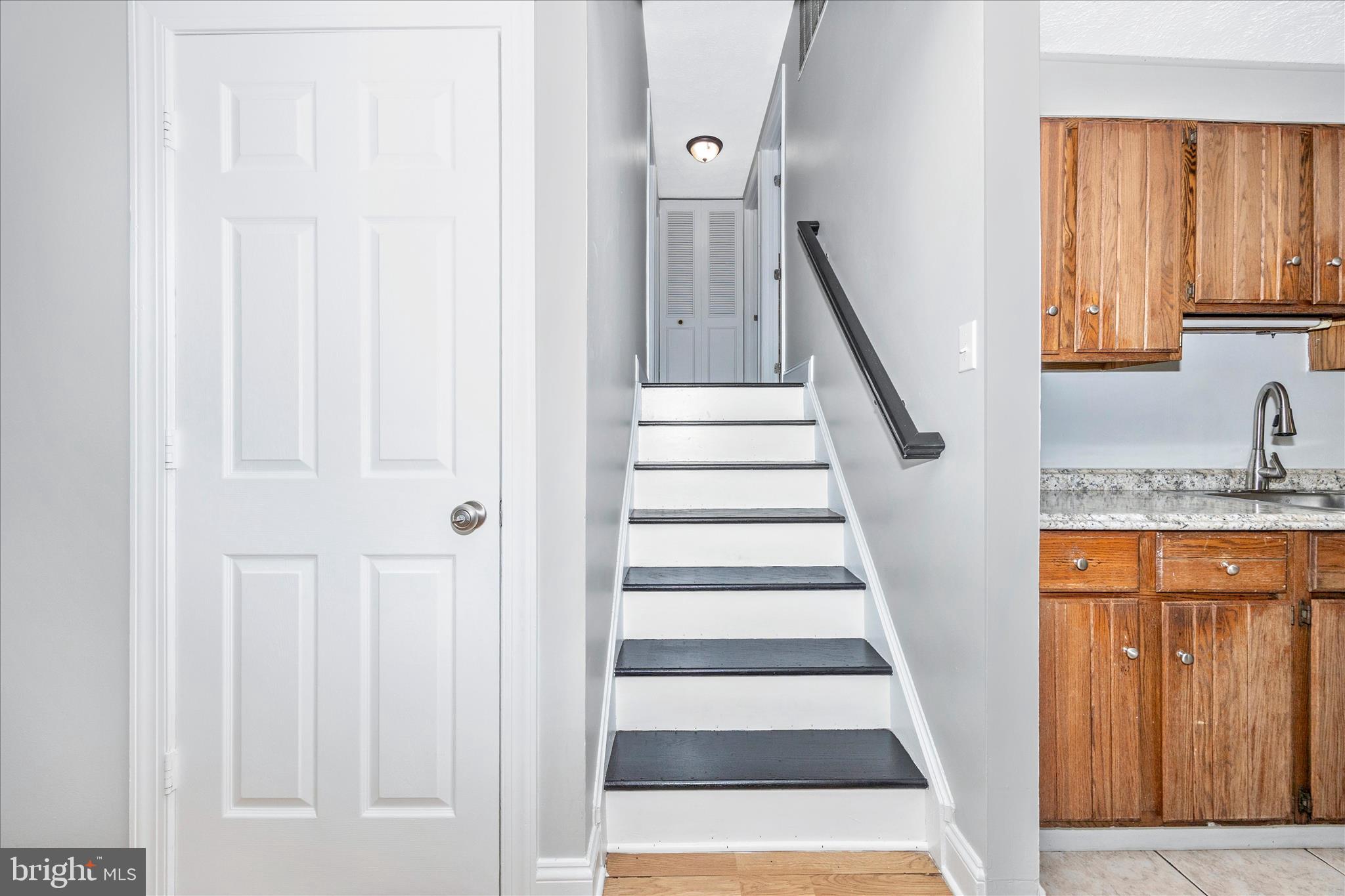 101 Andover Court Frederick, MD 21702 - Photo 8 of 29 a view of front door with stairs