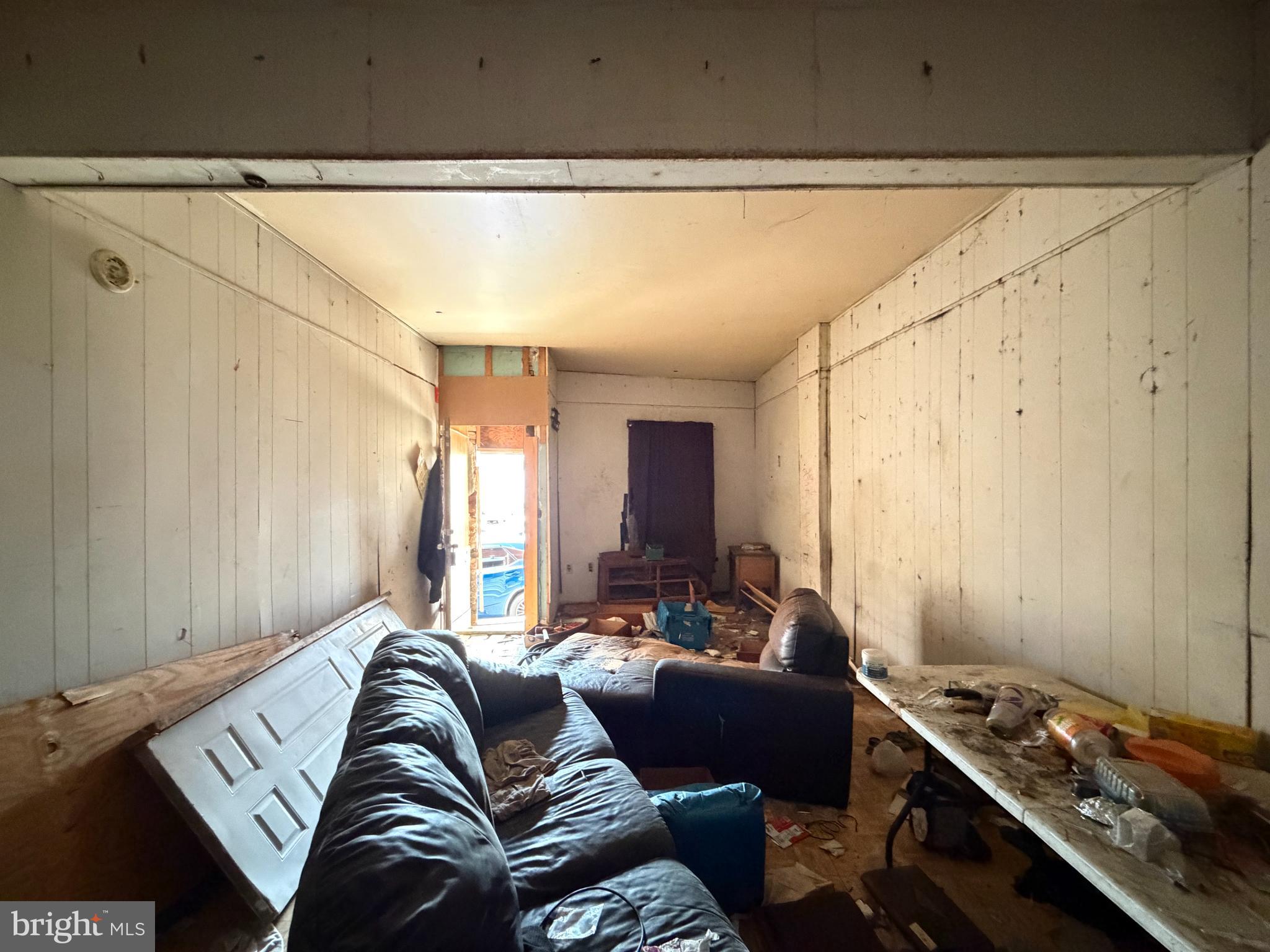 2667 St Benedict Street Baltimore, MD 21223 - Photo 5 of 14 a living room with furniture and a window