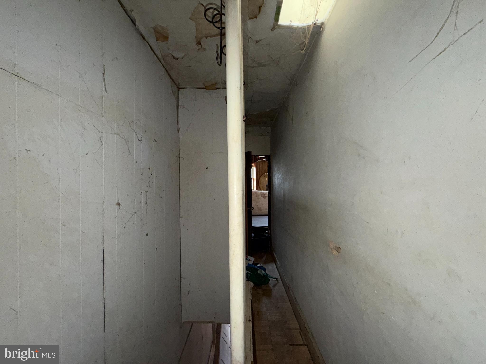 2667 St Benedict Street Baltimore, MD 21223 - Photo 10 of 14 a view of a hallway