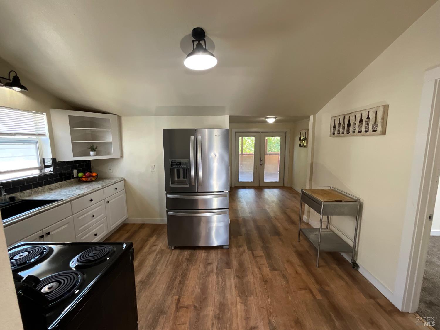 138 West 6th Street Santa Rosa, CA 95401 - Photo 10 of 31 Vaulted ceilings and newer LVP floors.