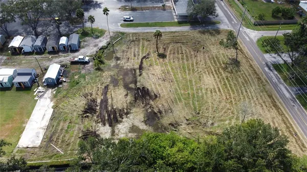 a view of a lake with a yard