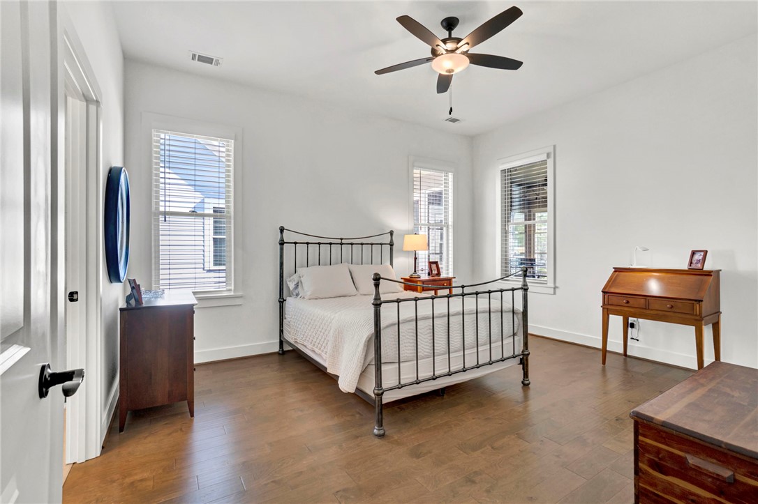 308 Pershing Avenue Clemson, SC 29631 - Photo 12 of 31 This airy bedroom offers a comfortable retreat with ample natural light.