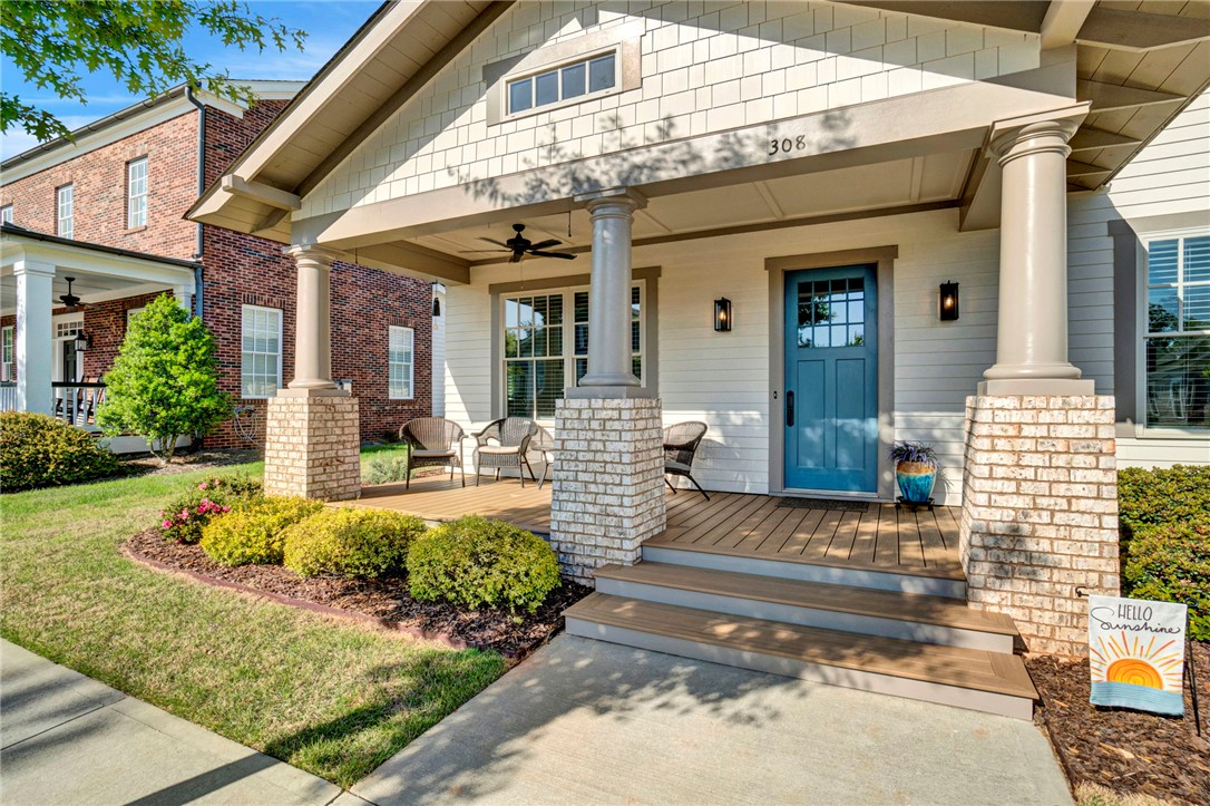 308 Pershing Avenue Clemson, SC 29631 - Photo 2 of 31 This inviting home showcases a welcoming front porch, perfect for enjoying outdoor moments.