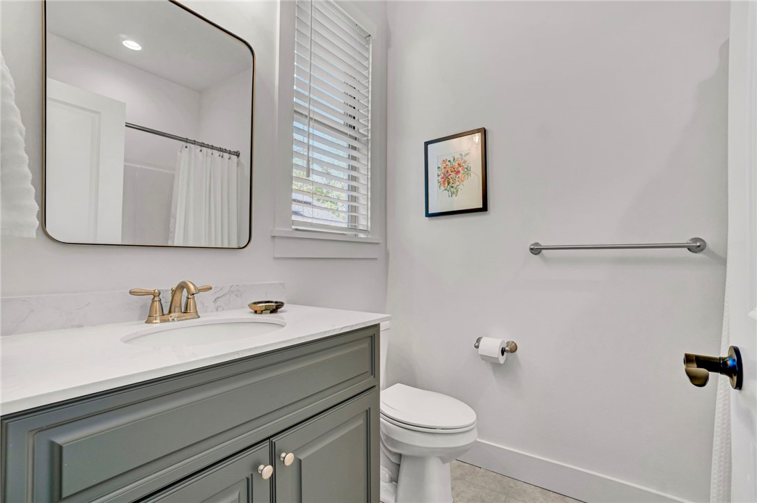 308 Pershing Avenue Clemson, SC 29631 - Photo 21 of 31 This bathroom features a sleek vanity, modern fixtures, and a bright, airy ambiance.