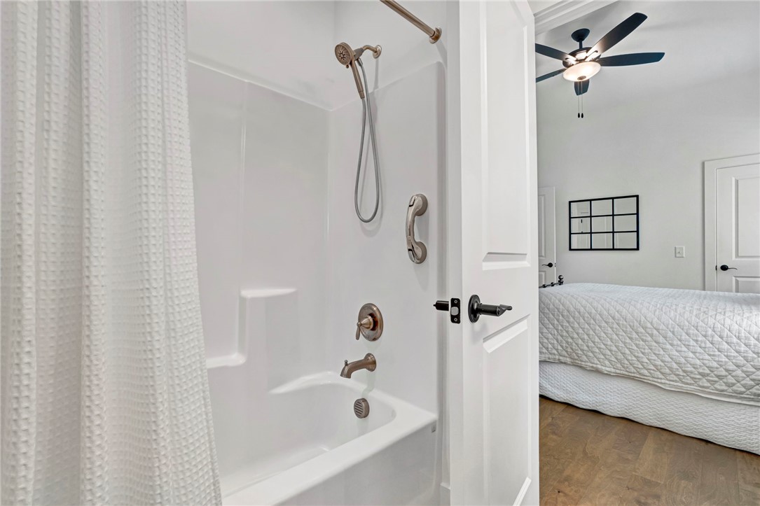 308 Pershing Avenue Clemson, SC 29631 - Photo 24 of 31 This serene bedroom offers a peaceful retreat with natural light and a comforting ambiance.