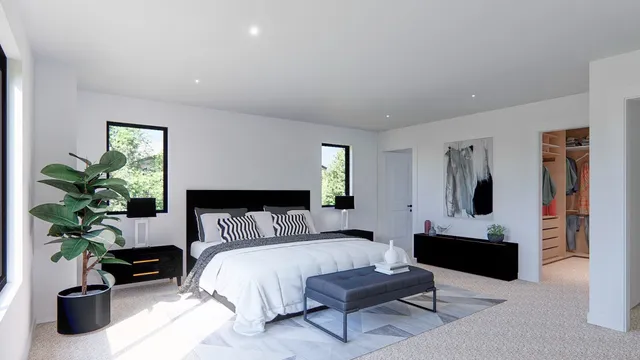 a bedroom with furniture and a potted plant