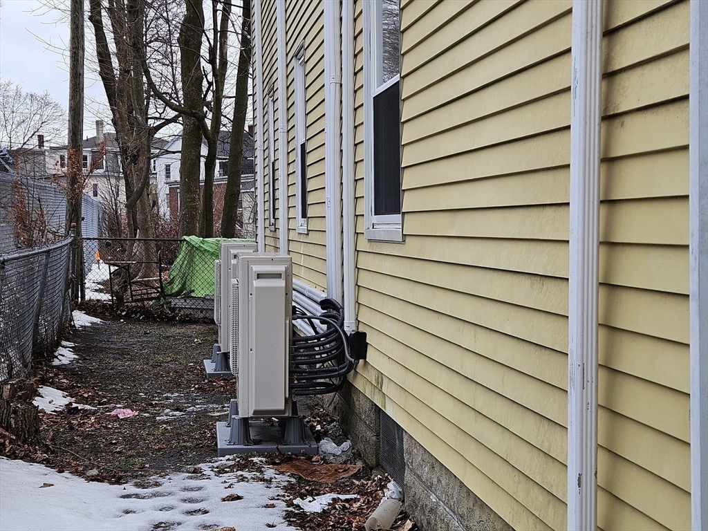 4 Vernon Terrace, Unit 2 Worcester, MA 01610 - Photo 12 of 12 a view of a house with backyard