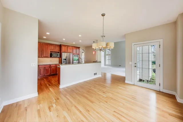 a view of a kitchen with cabinets