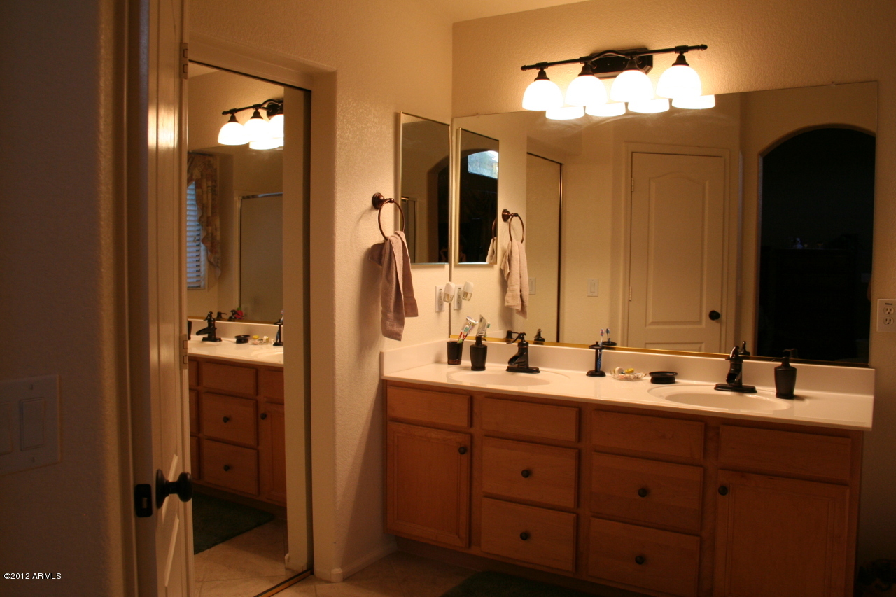 3847 East Simpson Road Gilbert, AZ 85297 - Photo 20 of 35 Master double sinks to HUGE walkin clst