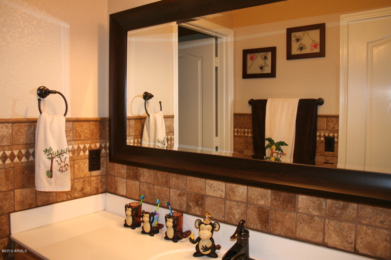 3847 East Simpson Road Gilbert, AZ 85297 - Photo 22 of 35 Hall Bath backsplash - back reflection