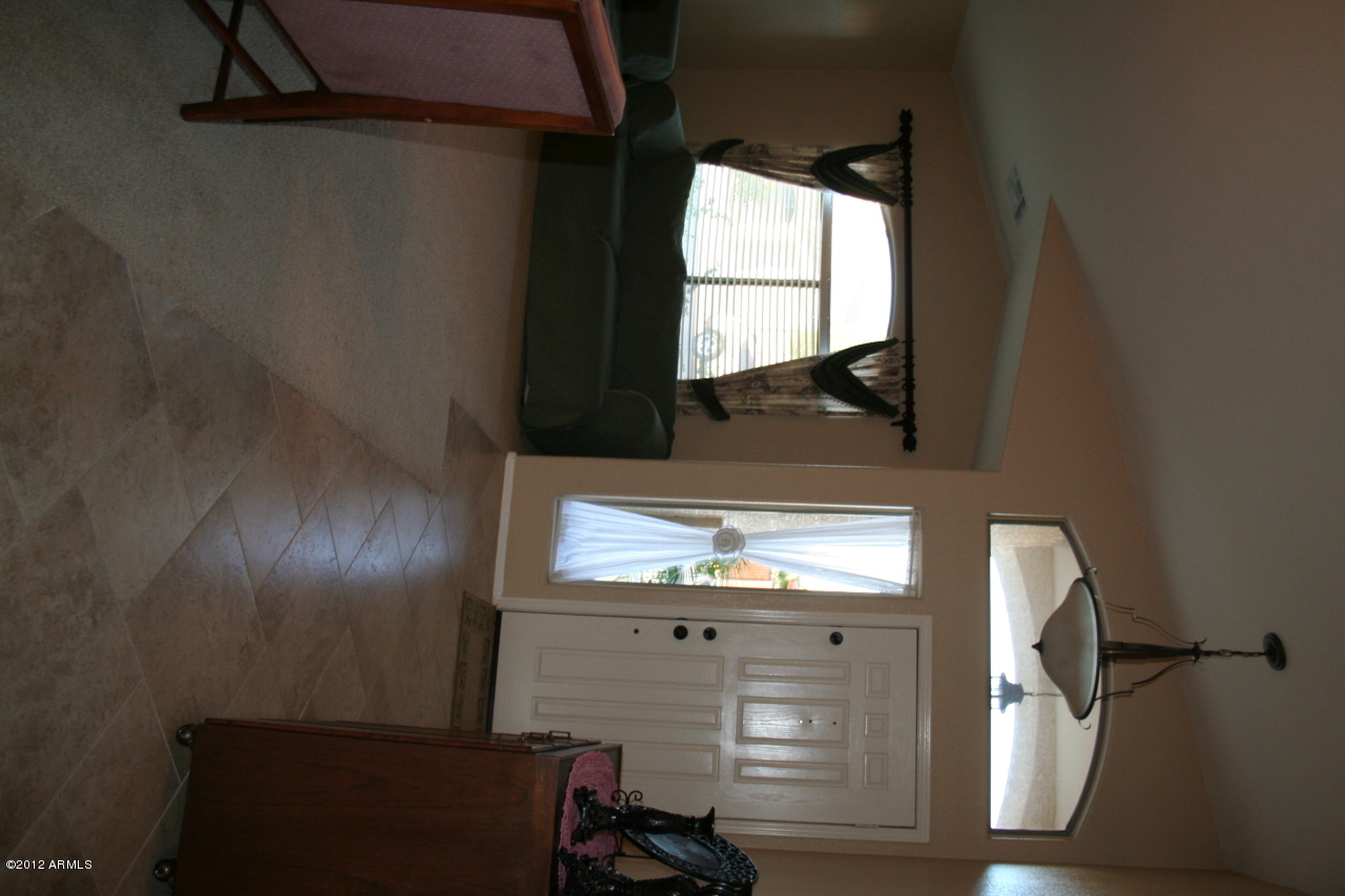 3847 East Simpson Road Gilbert, AZ 85297 - Photo 9 of 35 Dining to Liv Rm vertical