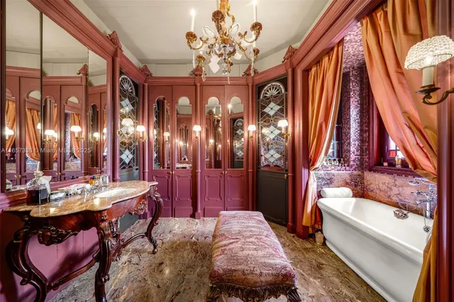 a view of a patio with chairs and a table