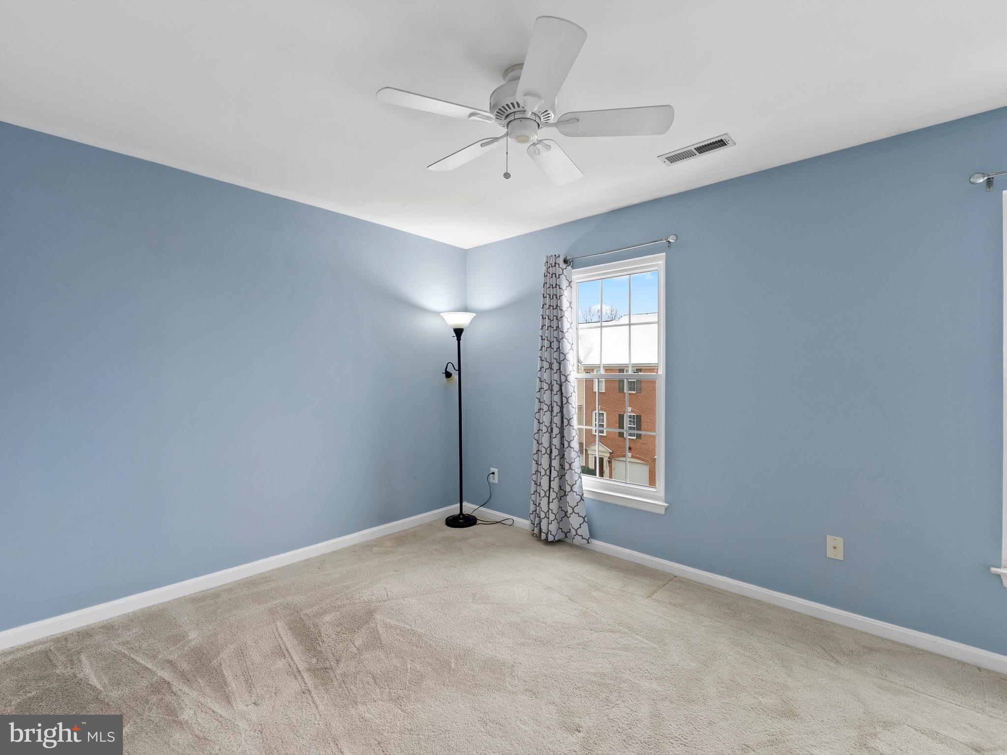 45458 Bluemont Junction Square Sterling, VA 20164 - Photo 19 of 24 a view of an empty room with a window