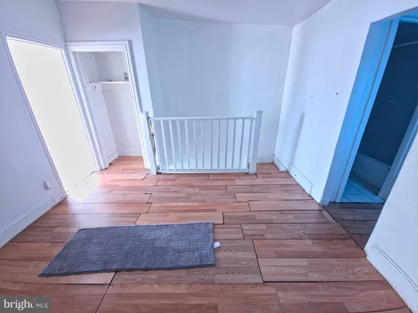 a kitchen with stainless steel appliances a refrigerator and a stove