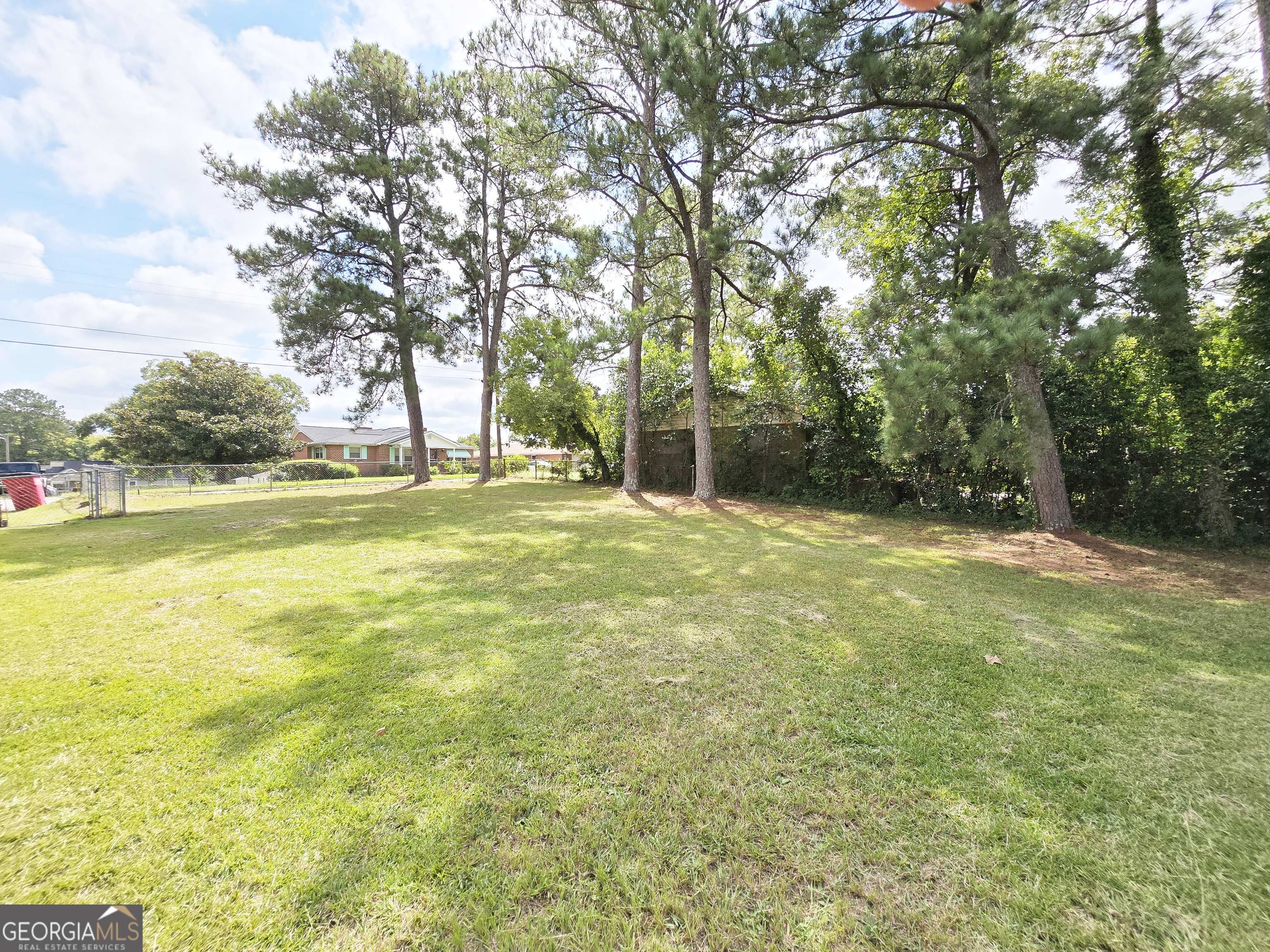 2249 Lowe Street Macon, GA 31206 - Photo 17 of 17 a view of a field with trees in the background
