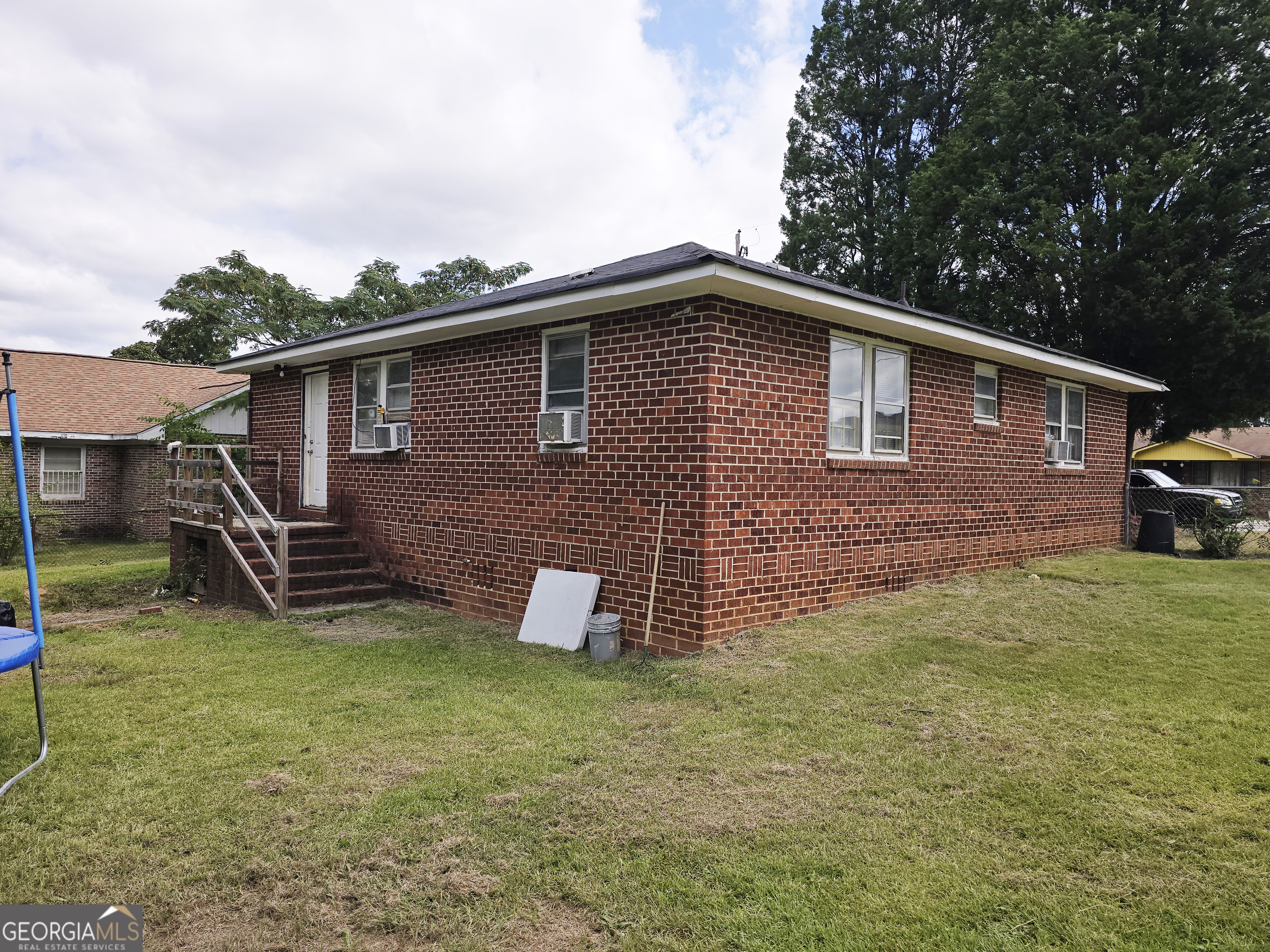 2249 Lowe Street Macon, GA 31206 - Photo 5 of 17 a view of a house with a yard