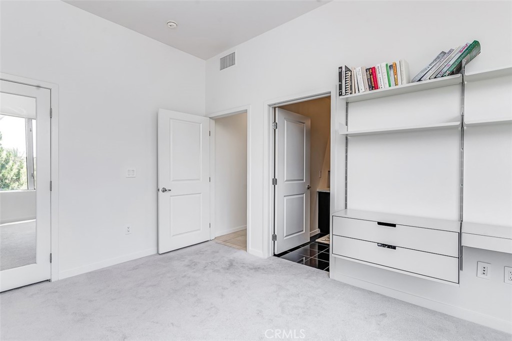 21 Gramercy, Unit 306 Irvine, CA 92612 - Photo 12 of 46 a view of an empty room