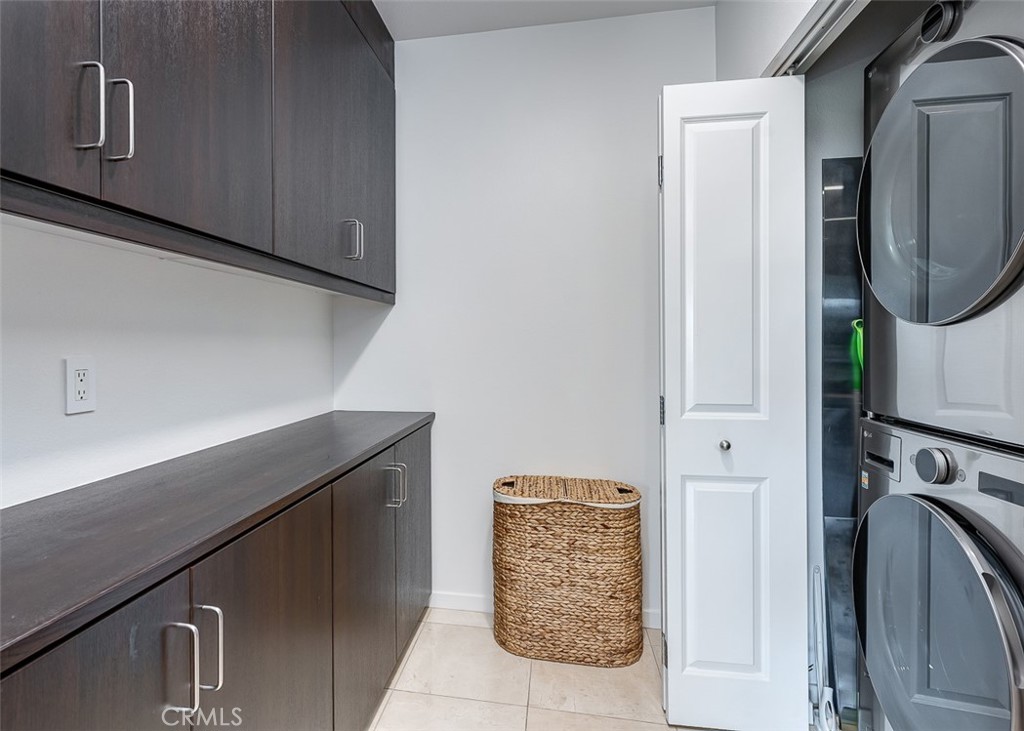 21 Gramercy, Unit 306 Irvine, CA 92612 - Photo 6 of 46 a room with storage and utility