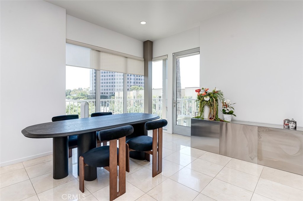 21 Gramercy, Unit 306 Irvine, CA 92612 - Photo 8 of 46 a view of a dining room with furniture
