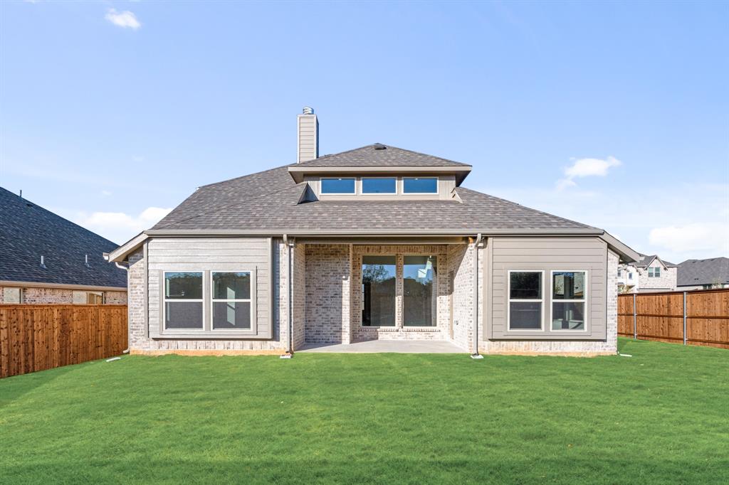 38 Osprey Street Joshua, TX 76058 - Photo 35 of 37 a front view of a house with a yard