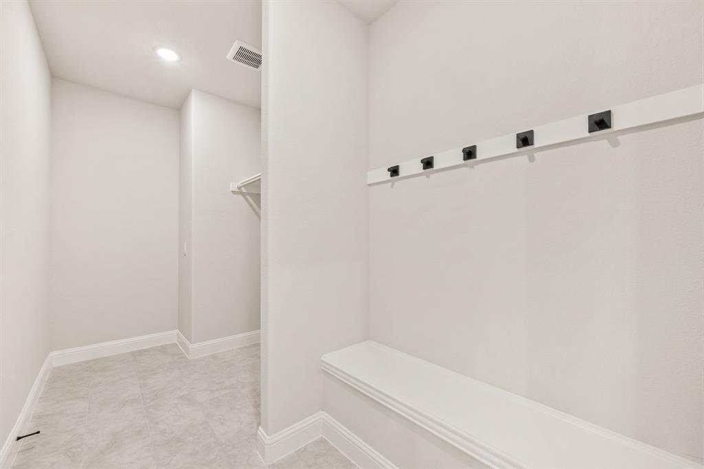 38 Osprey Street Joshua, TX 76058 - Photo 8 of 37 a bathroom with a shower